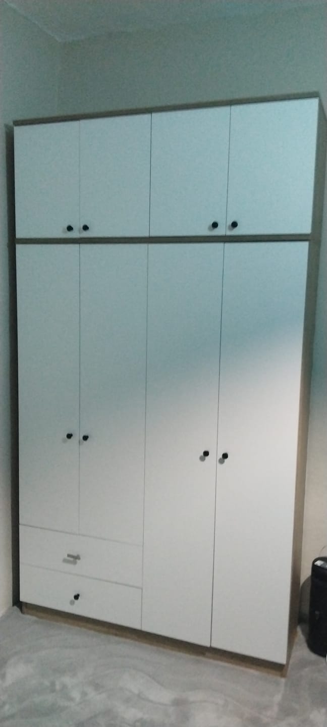 Customer photo review of Rani BA121 Geniş Gardırop Elbise Dolabı 8 Kapaklı 2 Çekmeceli 1 Raflı 2 Askılı Sepet Ceviz - Beyaz