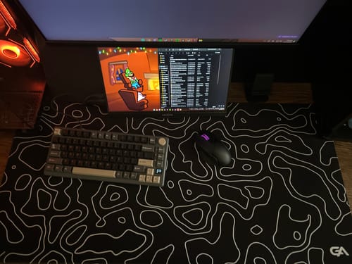 Customer photo review of Black Topo Mousepad