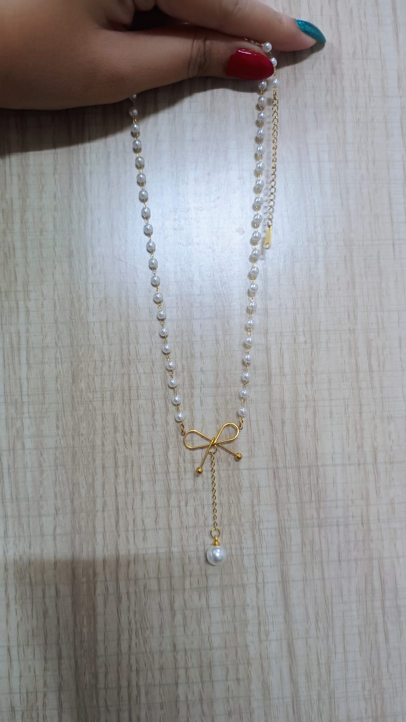 Customer photo review of Pearl Drop Bow Pendant Necklace