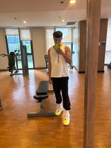 Reviewer at the gym wearing white Nike Everyday Plus Cushioned Training Crew Socks.