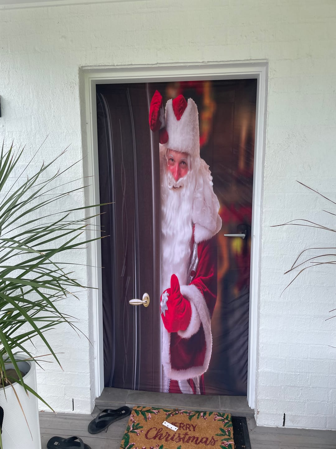 Customer photo review of Santa Claus Standing Behind The Door Front Door Cover