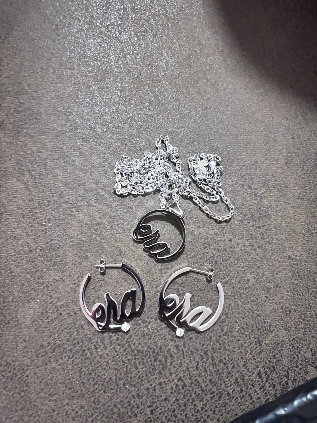 Customer photo review of Silver Era Logo Mini Hoops