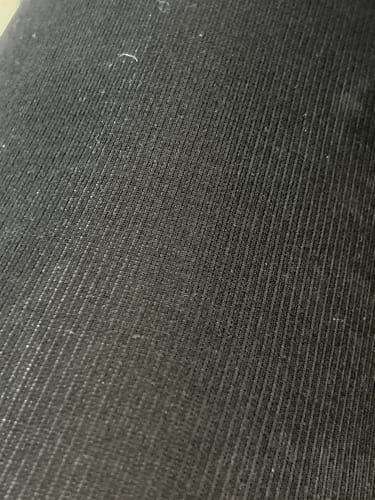Customer's close-up of the black ribbed fabric of the TOAST Fleece-Lined Tights.