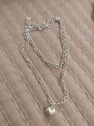 Reseña con foto de un cliente sobre Collar Doble Corazón