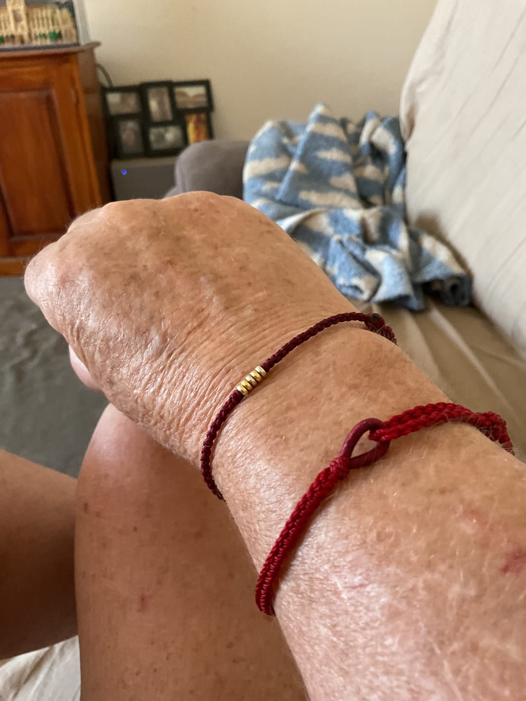 Customer photo review of Buddha Stones 925 Sterling Silver Lucky Golden Bead Braided String Bracelet Anklet