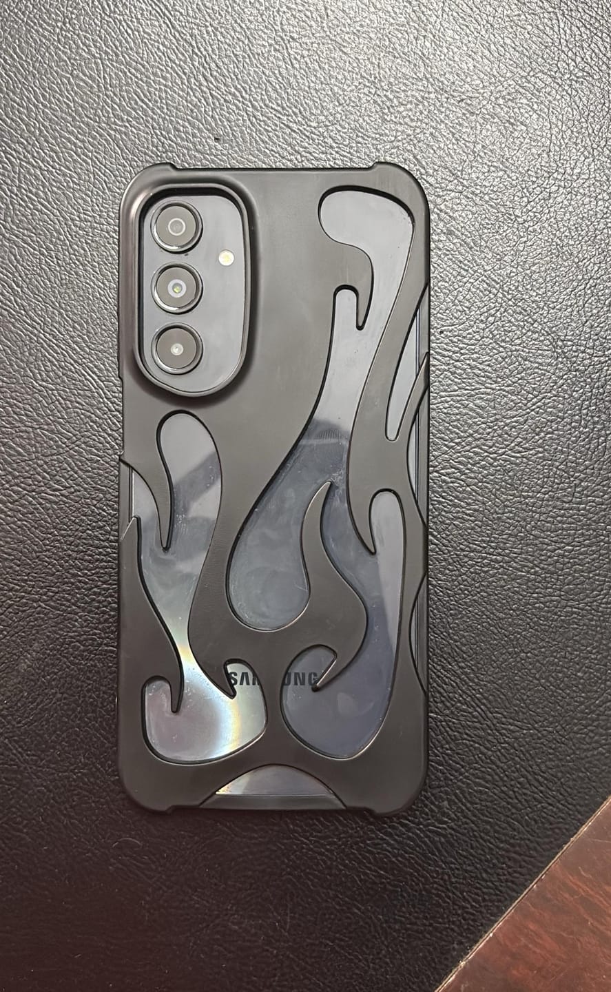 Customer photo review of 3D Flame Hollow Matte Black Silver Electroplated Samsung S & A Series Soft Case