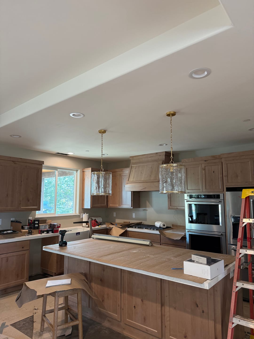 Customer photo review of Farmhouse Clear Textured Glass Cylinder Cage Pendant
