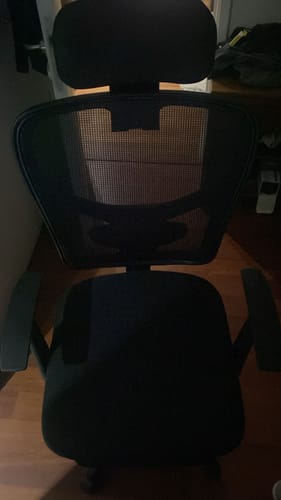 Customer photo review of Silla ejecutiva ergonómica con reposabrazos y reposapiernas retráctil