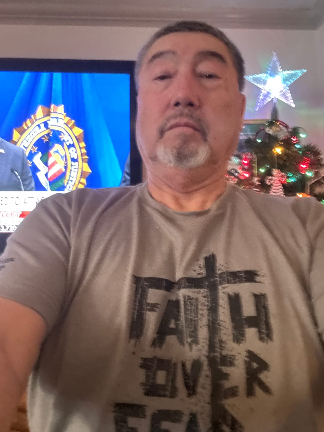Customer photo review of Faith Over Fear Tee