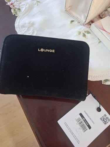 Reseña con foto de un cliente sobre Billetera Mediana Efecto Gamuza