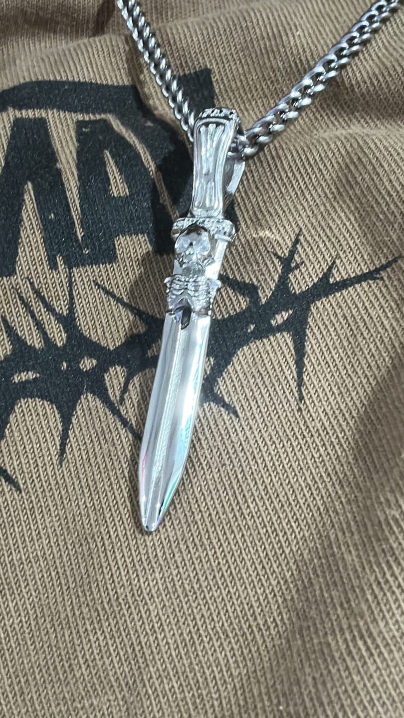 Customer photo review of CATACOMB SWORD PENDANT