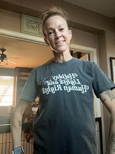 Customer photo review of Holiday Light and Human Rights Christmas Shirt