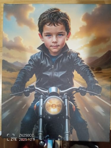 Customer's personalized 'Biker' portrait showing a boy in a black jacket on a motorcycle.