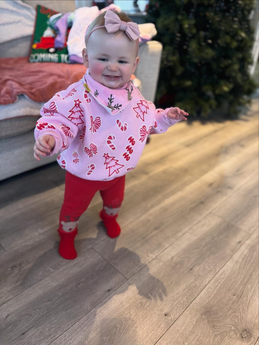 Customer photo review of Pink reindeer everywhere organic cotton DribbleBoo bandana bib