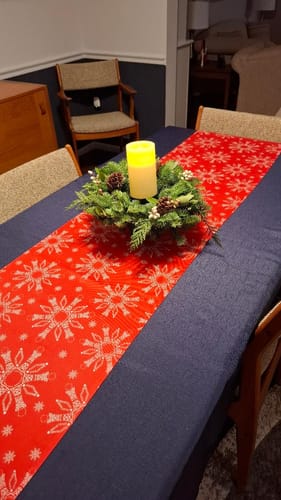 Customer photo review of Subtle F*ck Trump Red Snowflake Table Runner