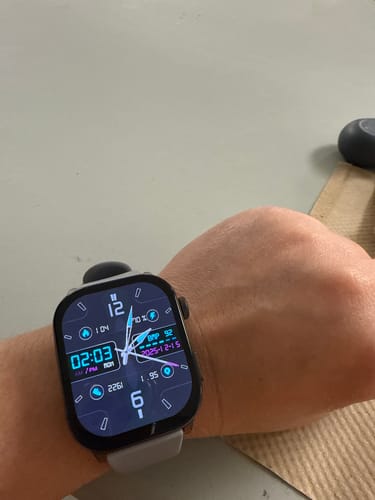 A customer's Gard Pro Health Smartwatch 3 on their wrist with the detailed digital watch face turned on.