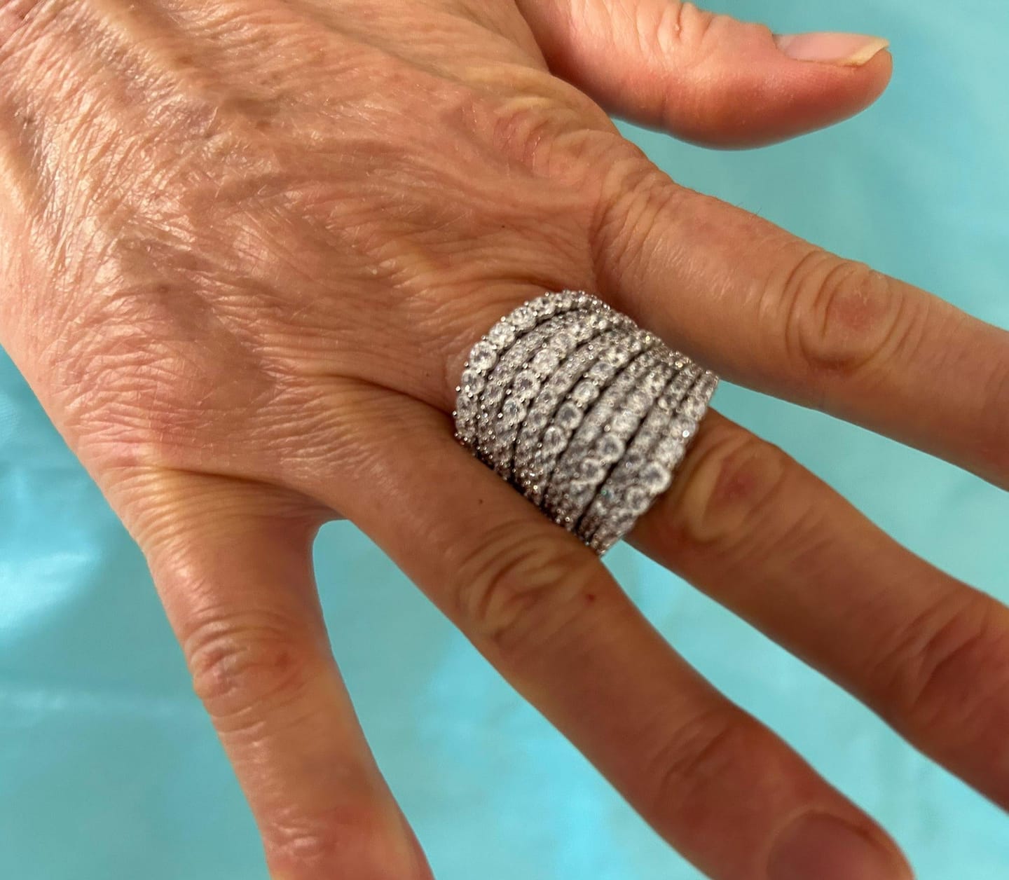 Customer photo review of Dazzling 925 Sterling Silver Pave Round Cut Wide Band Wedding Ring