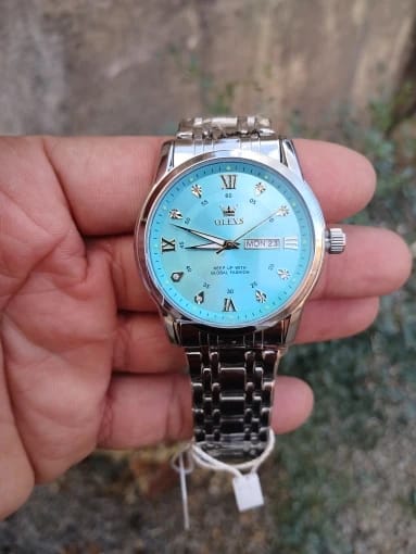 Customer photo review of OLEVS - Magnate