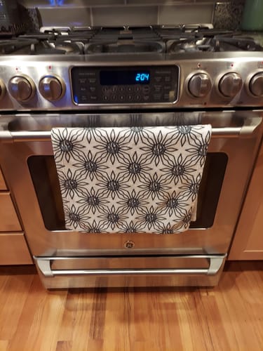 Customer photo review of F*ck Trump Black and White Sun Hand Towel