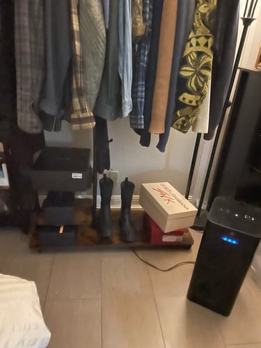 Customer photo review of Raybee Industrial Pipe Clothes Rack On Wheels, Portable Metal Garment Rack With Wooden Shelves