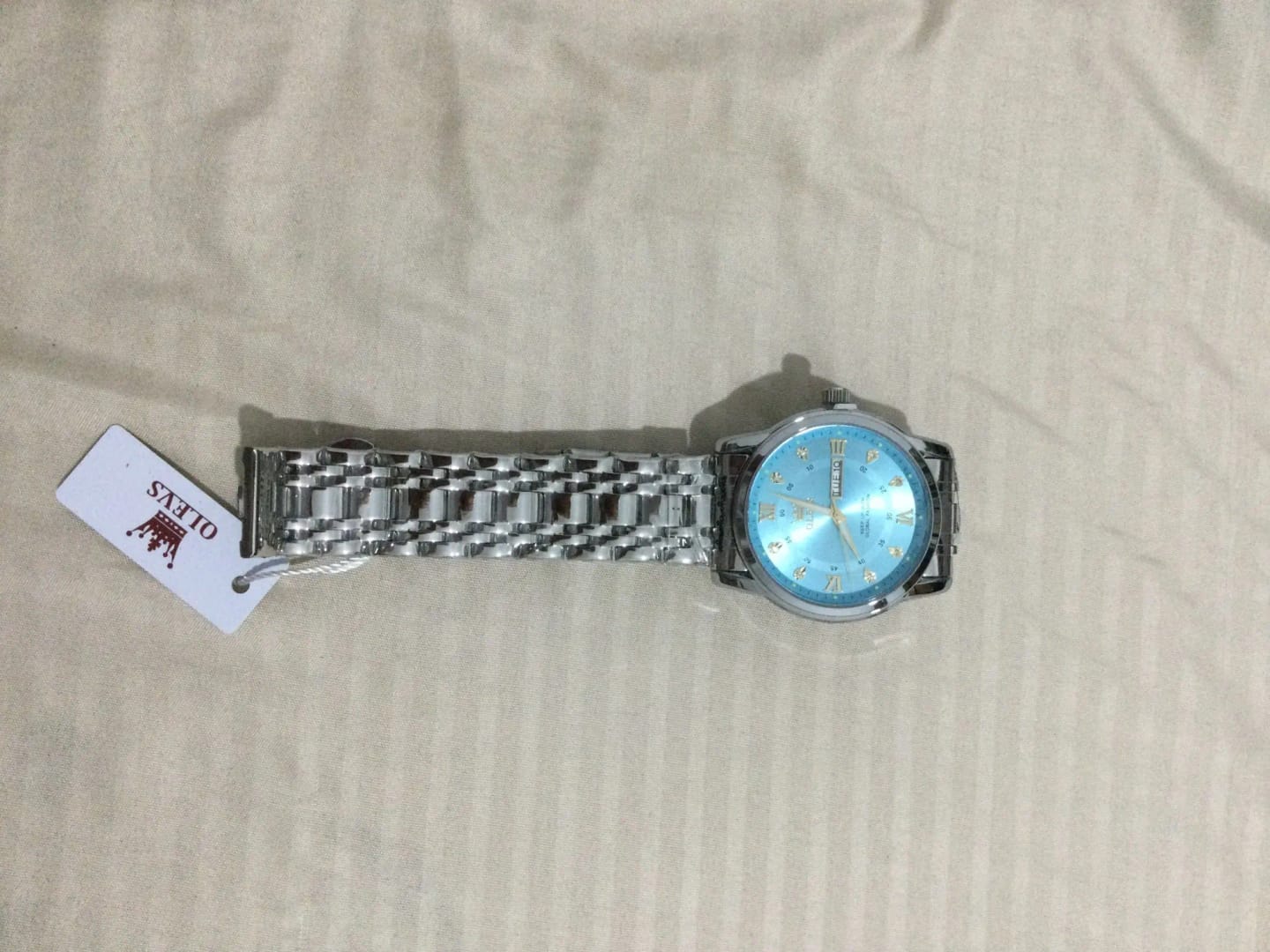 Customer photo review of OLEVS - Magnate