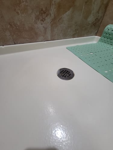 Customer photo review of Floor Crack Repair - Tub and Shower Repair Kit