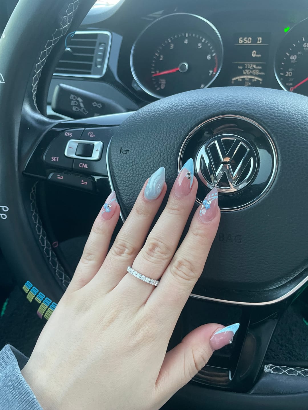 Customer photo review of Princess Cut Moissanite Half Eternity Band