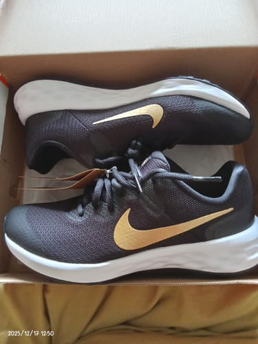 Customer photo review of Nike Revolution 6 GS 'Black Metallic Gold'