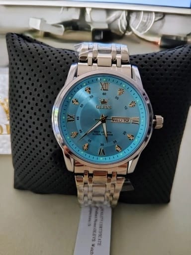 Customer photo review of OLEVS - Magnate