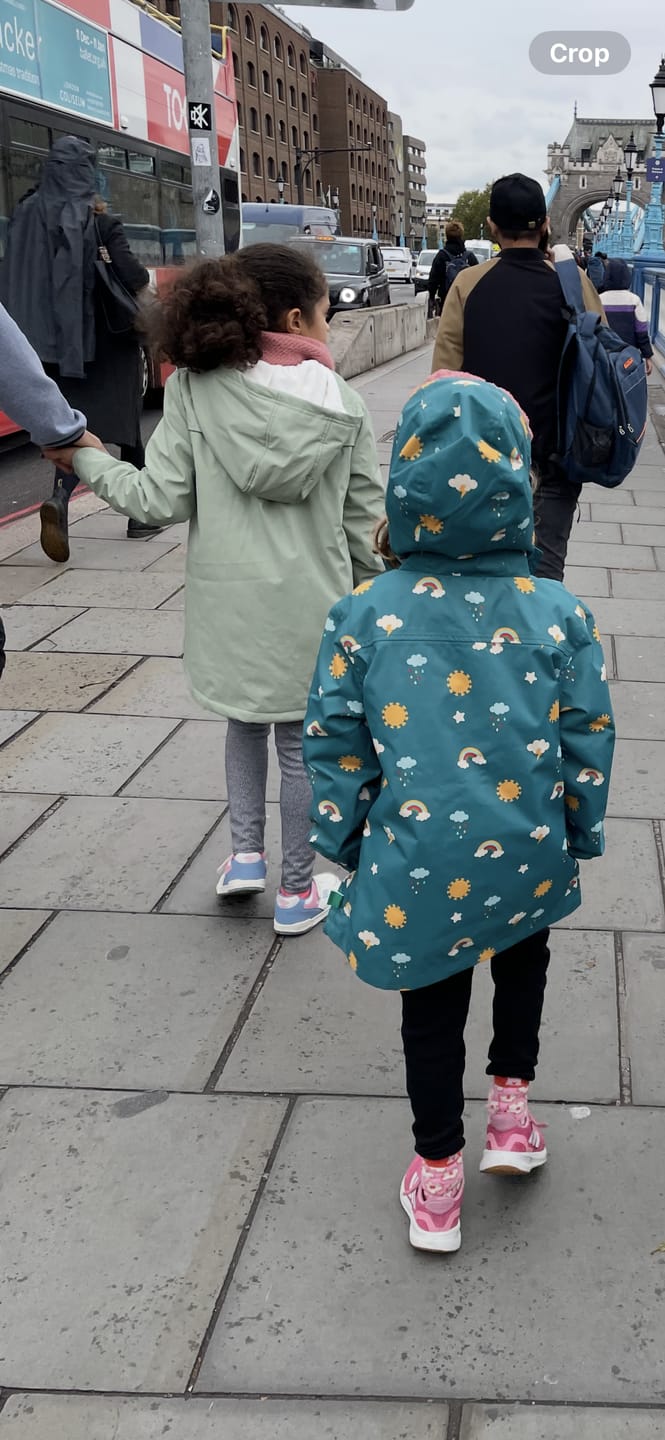 Customer photo review of Rainbow Days Recycled Waterproof Raincoat