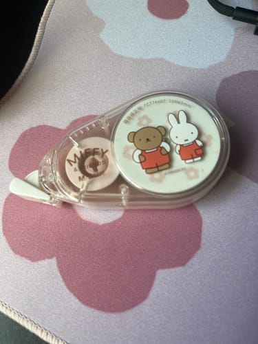 Customer's Miffy & Friends Correction Tape with a cute Miffy and bear design, shown on a pink floral mat.