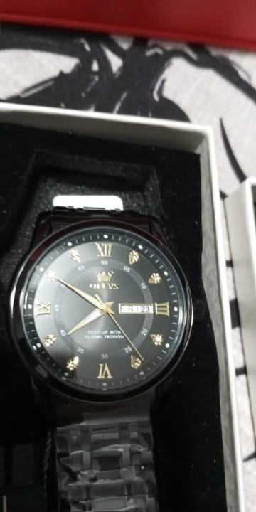 Customer photo review of OLEVS - Magnate
