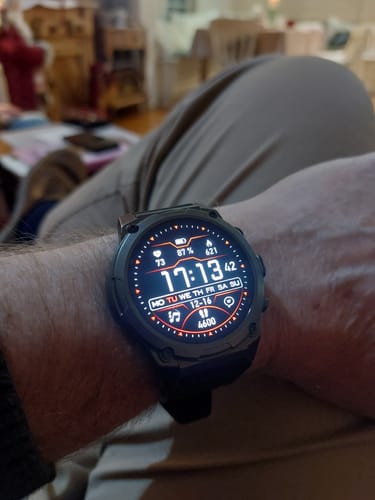 Close-up of a customer's Gard Pro Ultra 3 smartwatch on their wrist, showing the detailed digital display.