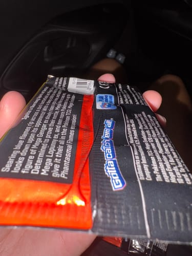 Customer photo review of Pokémon Scarlet & Violet 'Mega Evolutions Phantasmal Flames' Booster Bundle