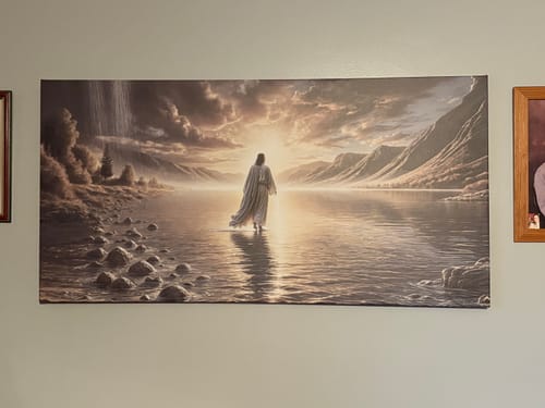 Customer's 'Walking on Water - Faith Wall Art II' canvas print hung on a wall.