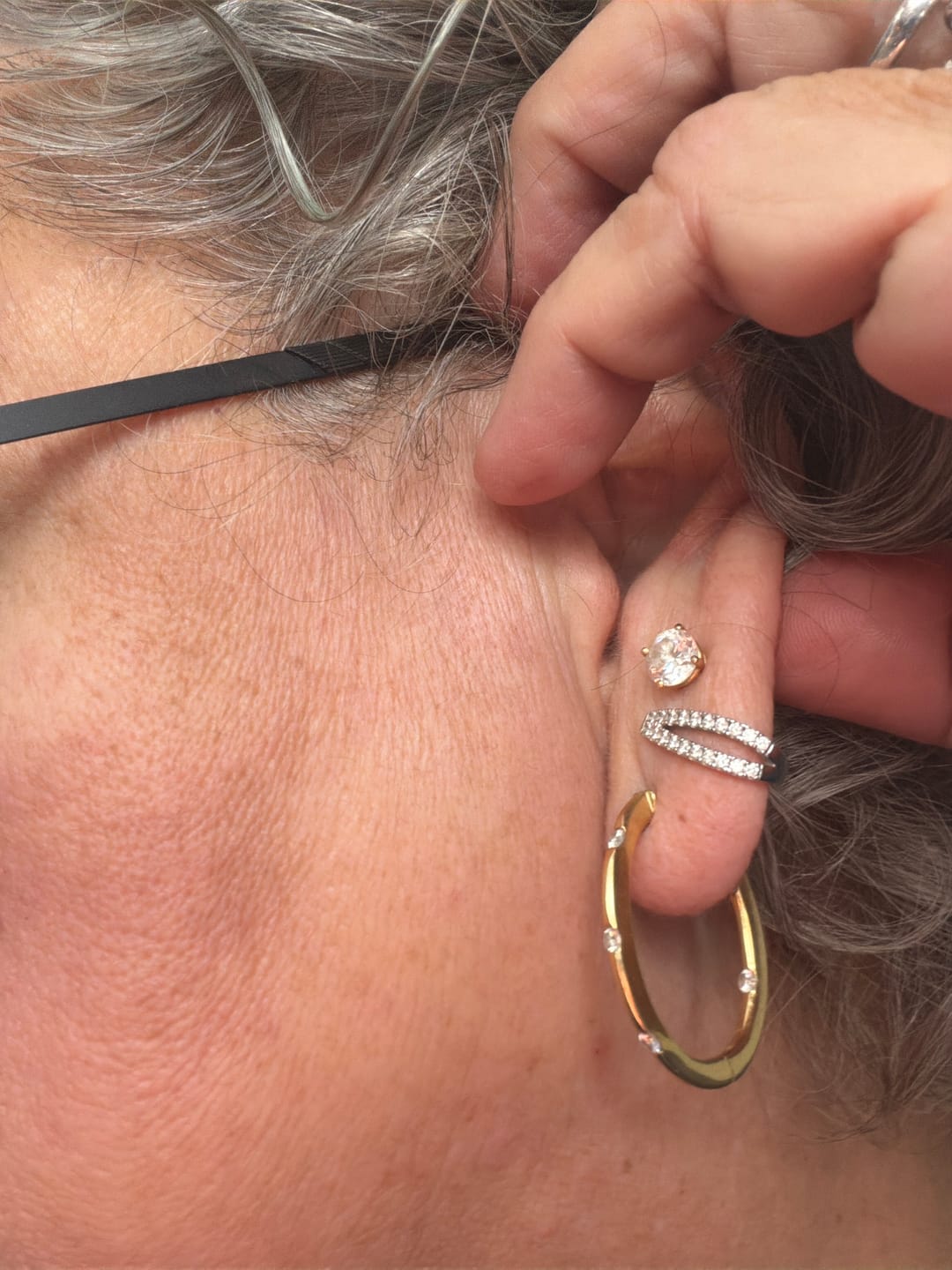 Customer photo review of S925 Moissanite U-shaped Round Cut Earrings In Sterling Silver