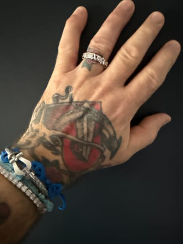 Customer photo review of MOISSANITE ETERNITY X RING.