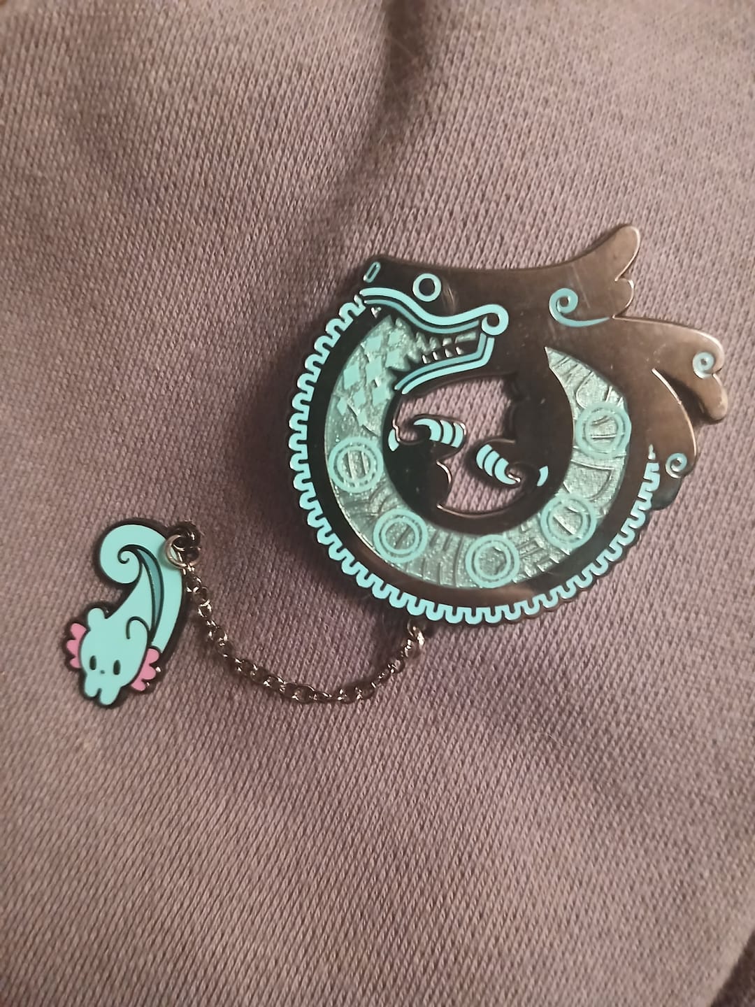Customer photo review of Rain World - Cyan Lizard Hanger Pin