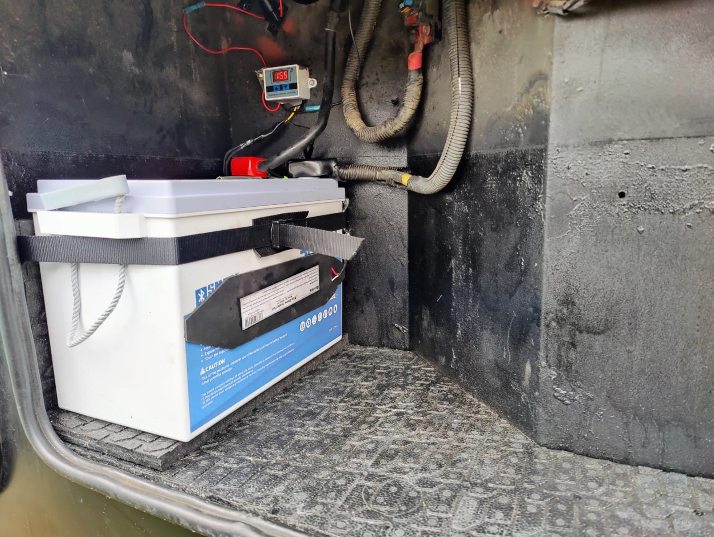 Redodo 12V 320Ah mini LiFePO4 battery in an RV Battery compartment