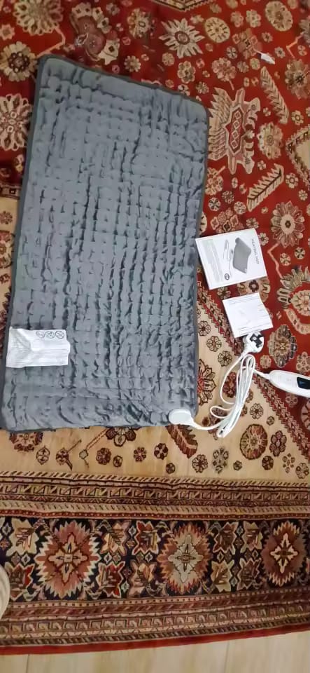 Customer photo review of Elektrische Heizdecke – Wärmeauflage für Rücken, Bauch & Beine mit 6 Temperaturstufen