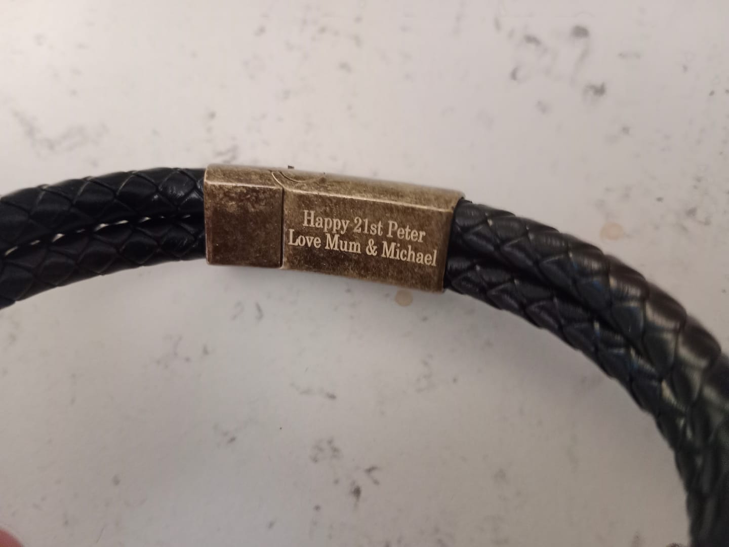 Customer photo review of Black Double Braided Personalised Leather Bracelet with Brass Coloured Clasp