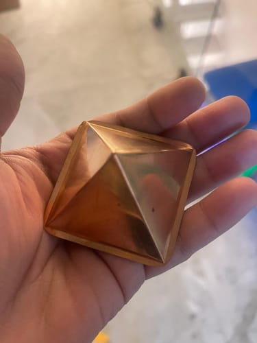 Customer photo review of Premium Hollow Copper Pyramid – 100% Pure Copper Vastu Energy Corrector for Home, Office & Healing by Vastu Mandir