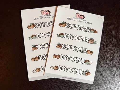 Customer's two sheets of cute Squirrelly Acorn planner stickers for October, featuring acorn illustrations.