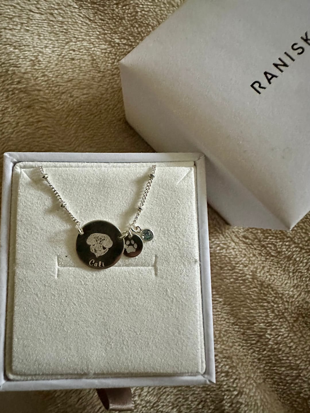 Customer photo review of Ruby Medium Focus Noseprint Necklace