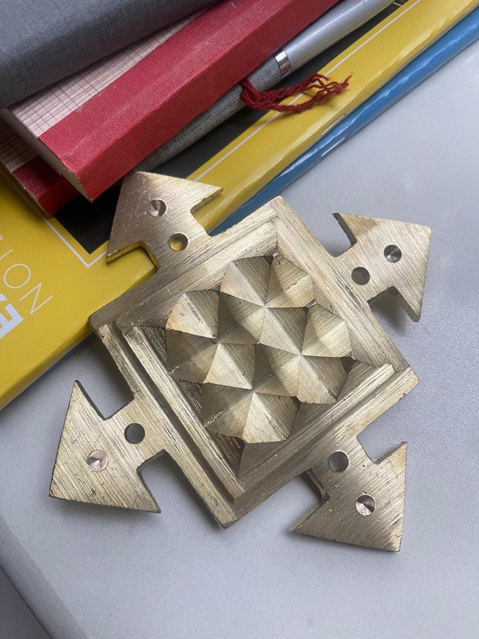Customer photo review of Premium 100% Pure Brass Arrow Pyramid Plate Spiritual Helix Heal Vastu Dosh for South Direction for Vastu Positive Energy of Main Door Entrance, Kitchen, Bedroom, Office by Vastu Mandir