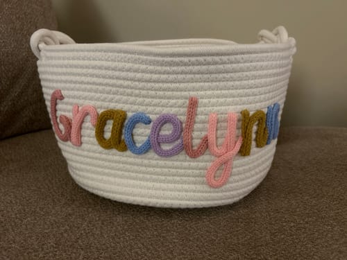 Reviewer's white Personalized Knitted Basket customized with the name Gracelynn in multicolor yarn.