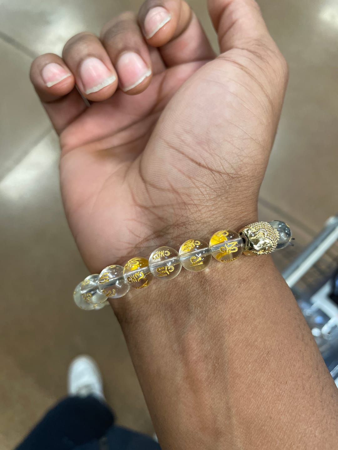 Customer photo review of Gold Buddha Mantra Bracelet