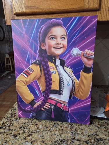 Customer's K-Pop Queen The Magic Beats portrait of a smiling girl singing, displayed on a home counter.
