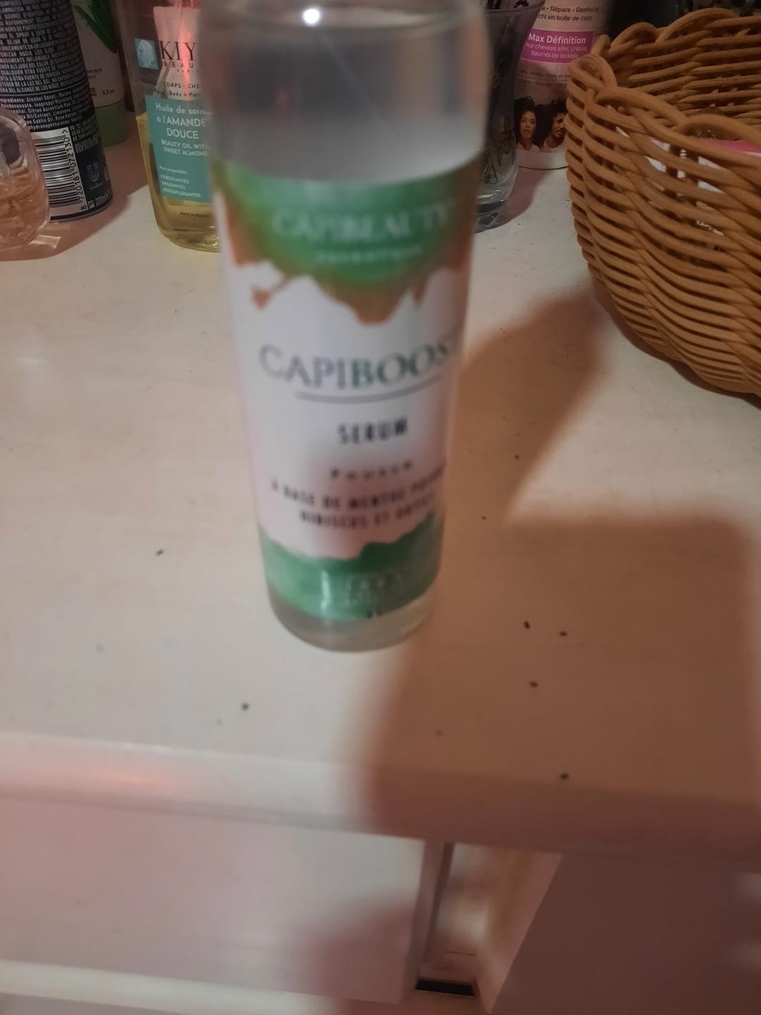Customer photo review of Sérum Capiboost Hibiscus & Orties 150ml pour la pousse des cheveux bouclés frisés crépus