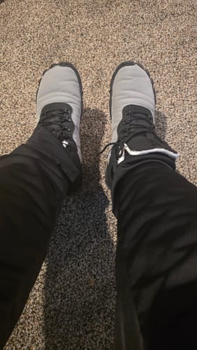 Customer's top-down view of their grey and black Lorax Pro barefoot shoes with a visible white lining.